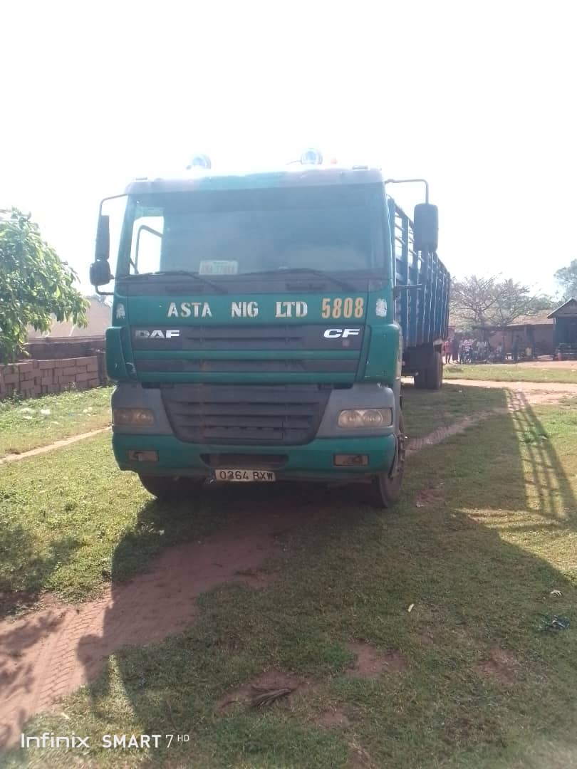 The second truck involved in the fatal crash stands in an open field near the Enjema–Okobo mining route