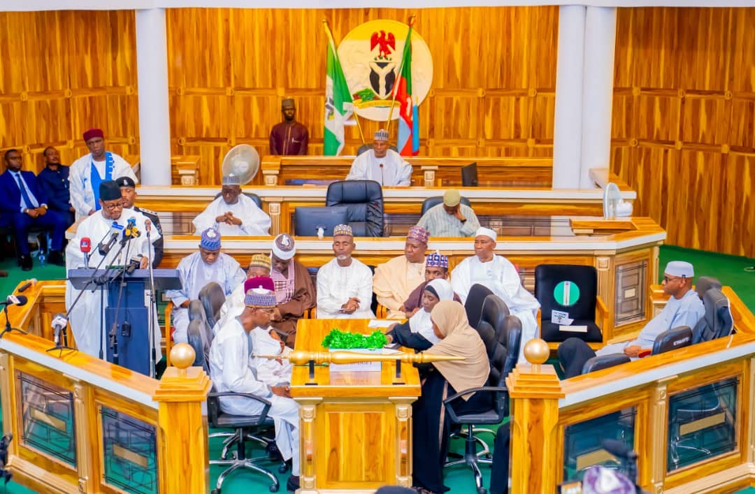 Governor Dikko Radda (centre) inside the chambers of the State House of Assembly after presenting the 2026 fiscal budget